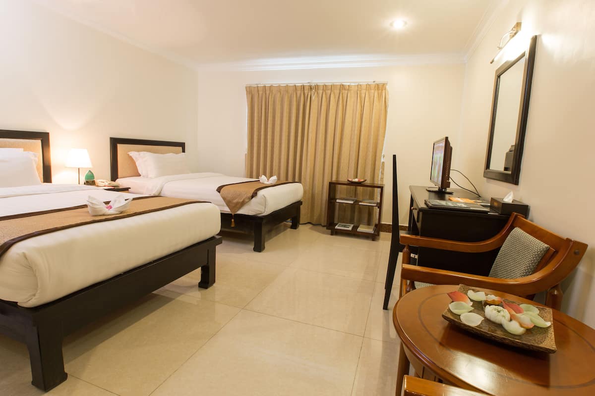 Ropa de cama de alta calidad y minibar