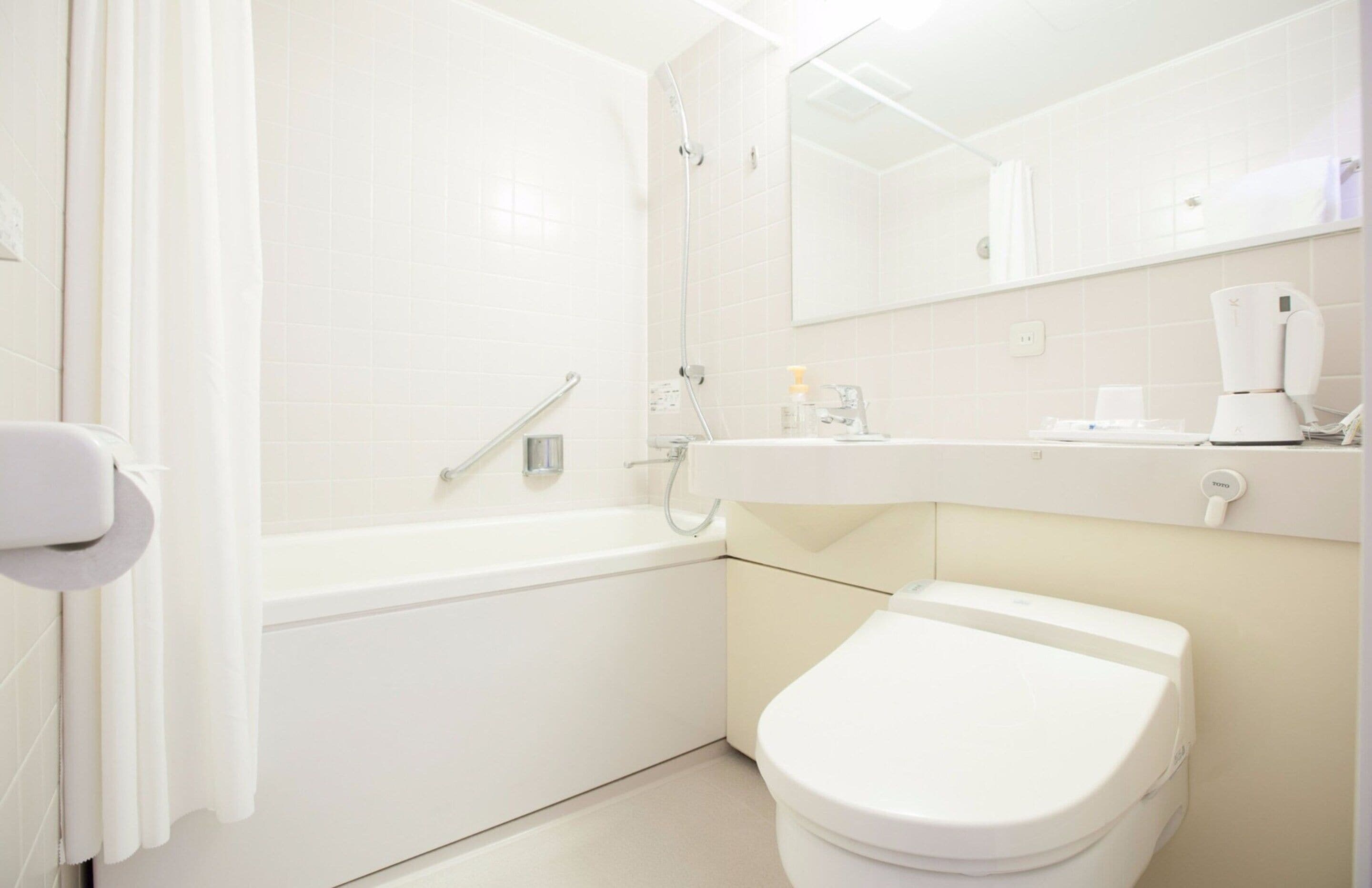 combined shower/bathtub, free toiletries, hair dryer, bathrobes