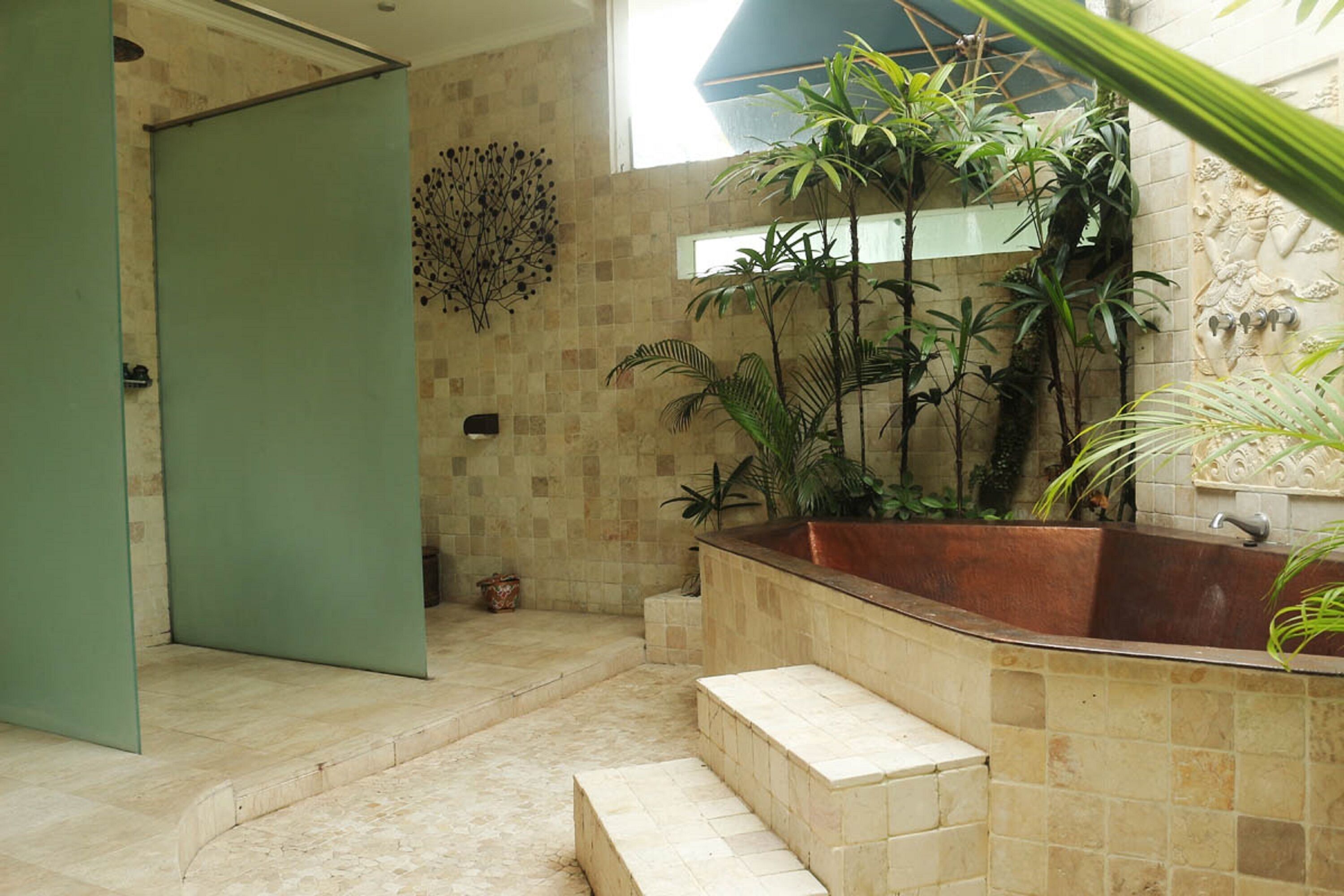 the luxury suite | bathroom | separate bathtub and shower, rainfall showerhead, designer toiletries