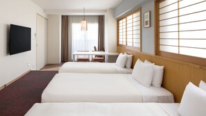 A hotel room with two beds, a desk, a chair, a TV, and a window with blinds. - Tokyu Stay Monzen Nakacho Tokyo (Tokyo)