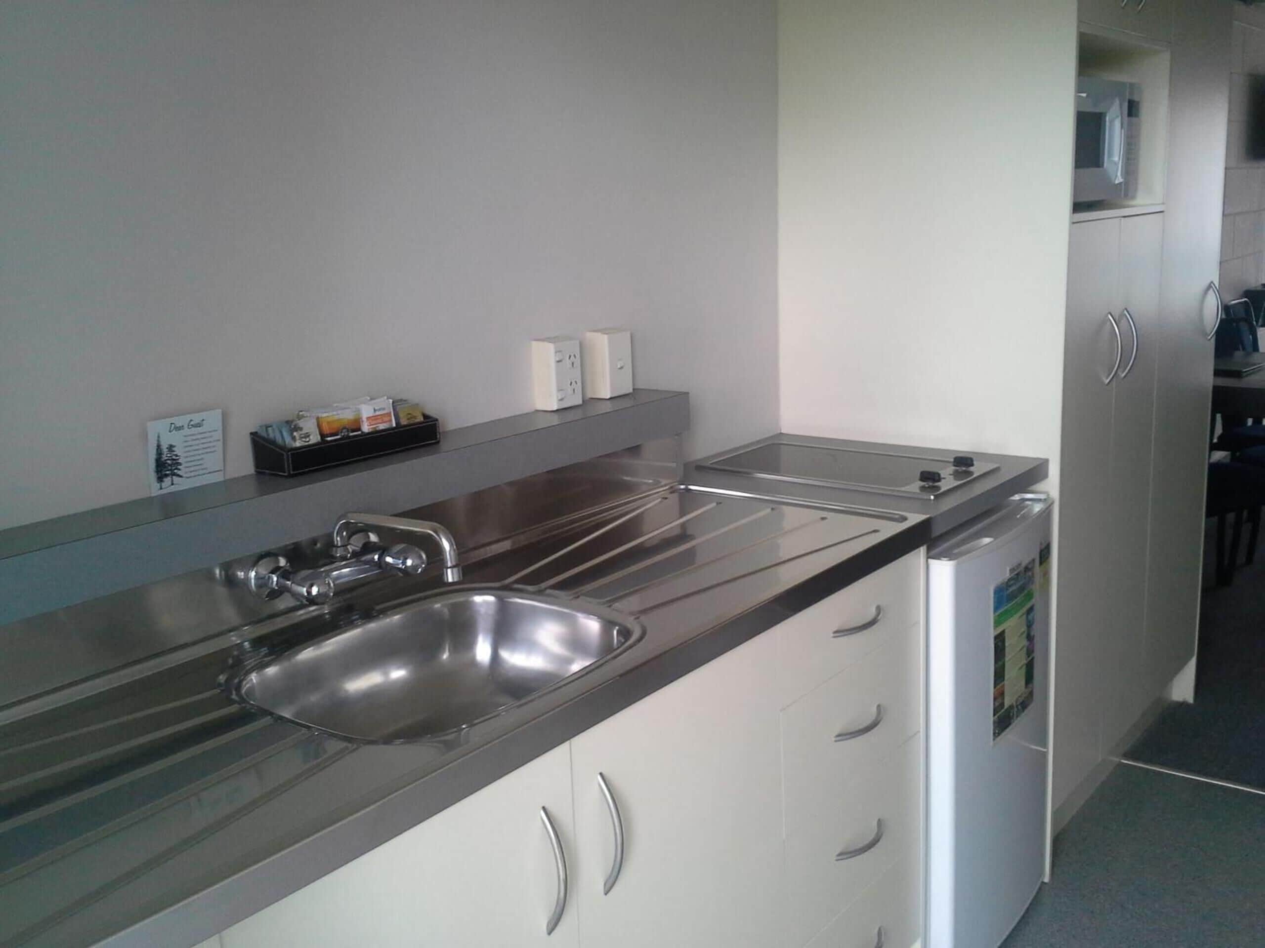 fridge, microwave, stovetop, electric kettle