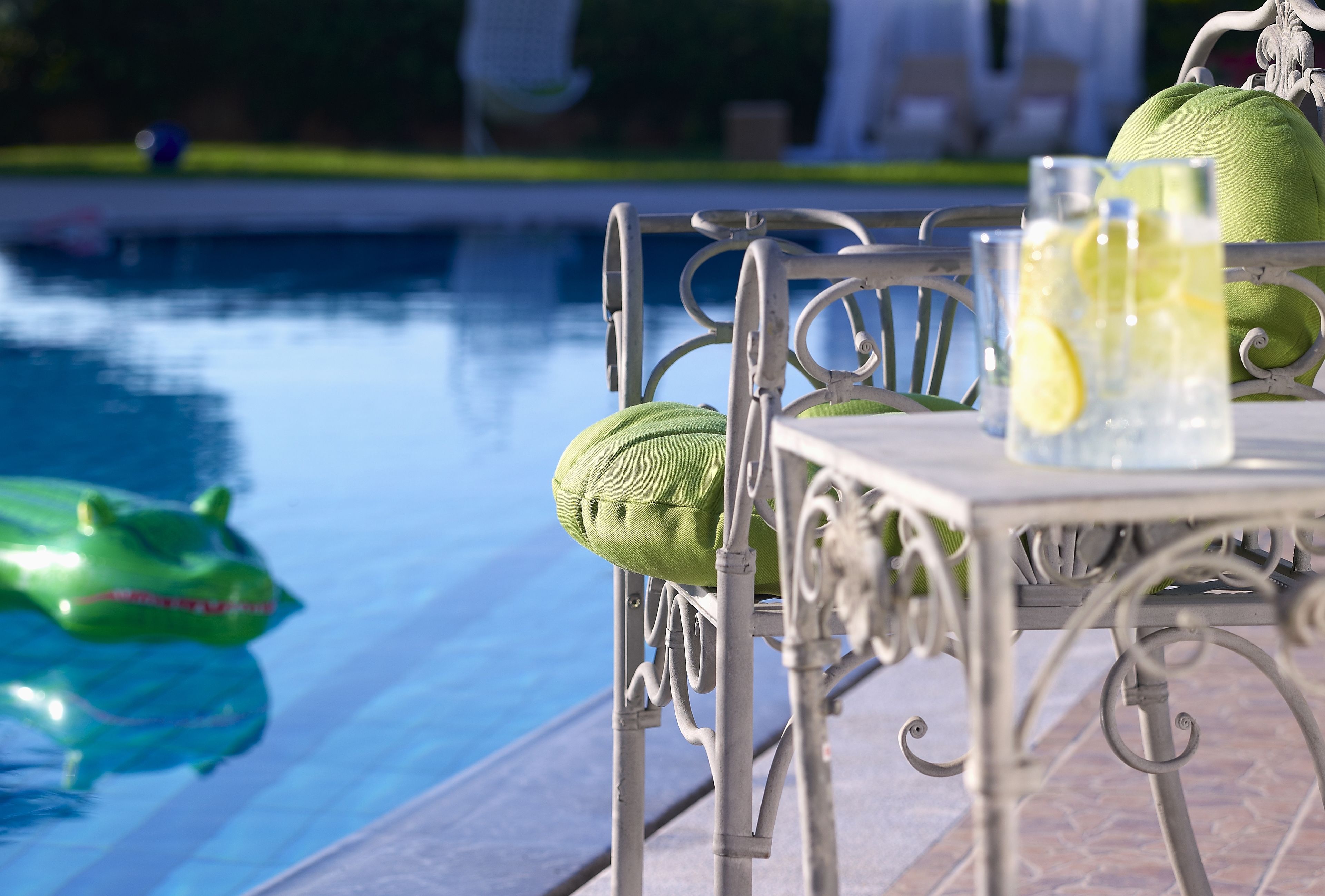 seasonal outdoor pool, pool umbrellas, pool loungers