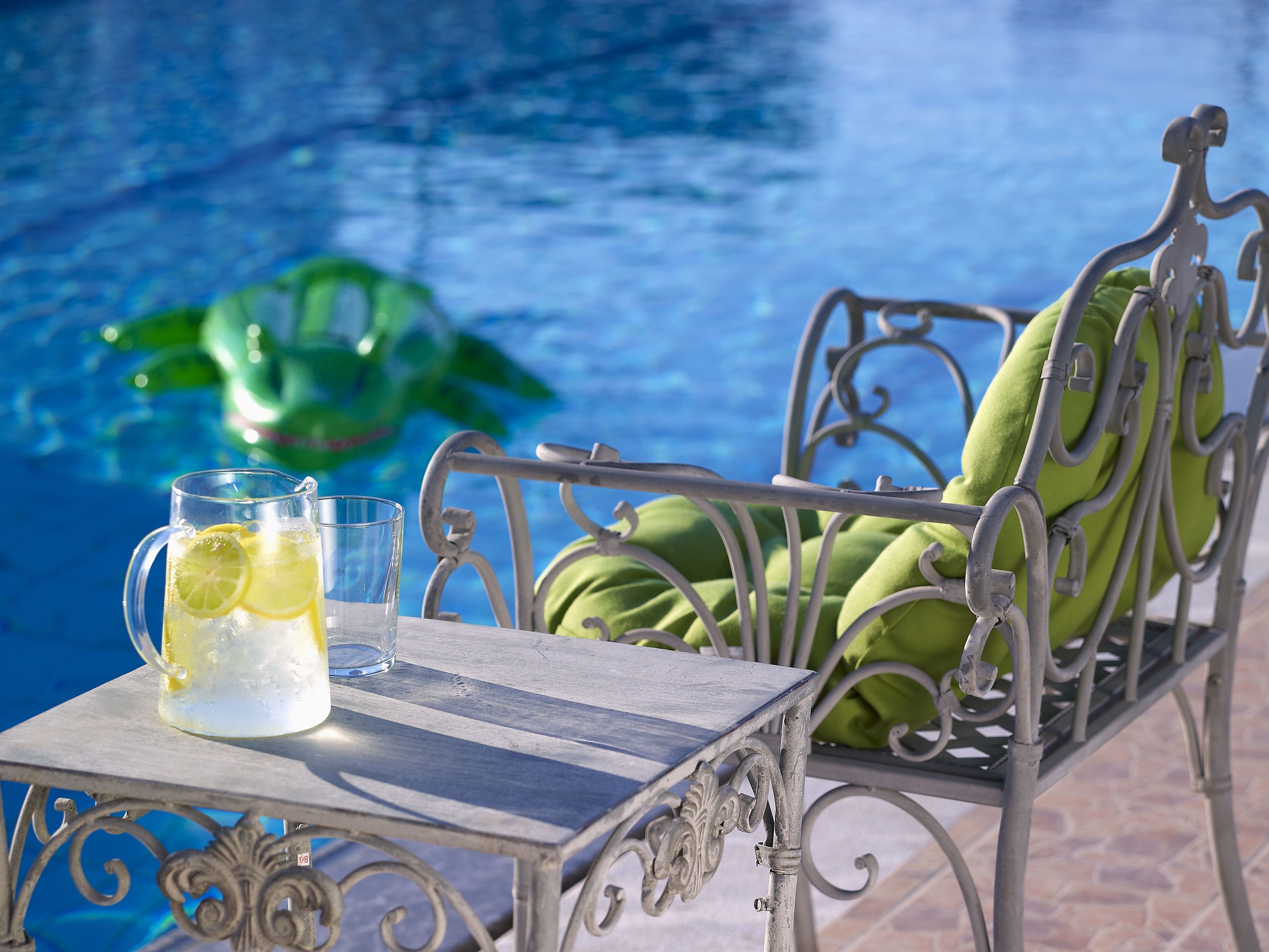 seasonal outdoor pool, pool umbrellas, pool loungers