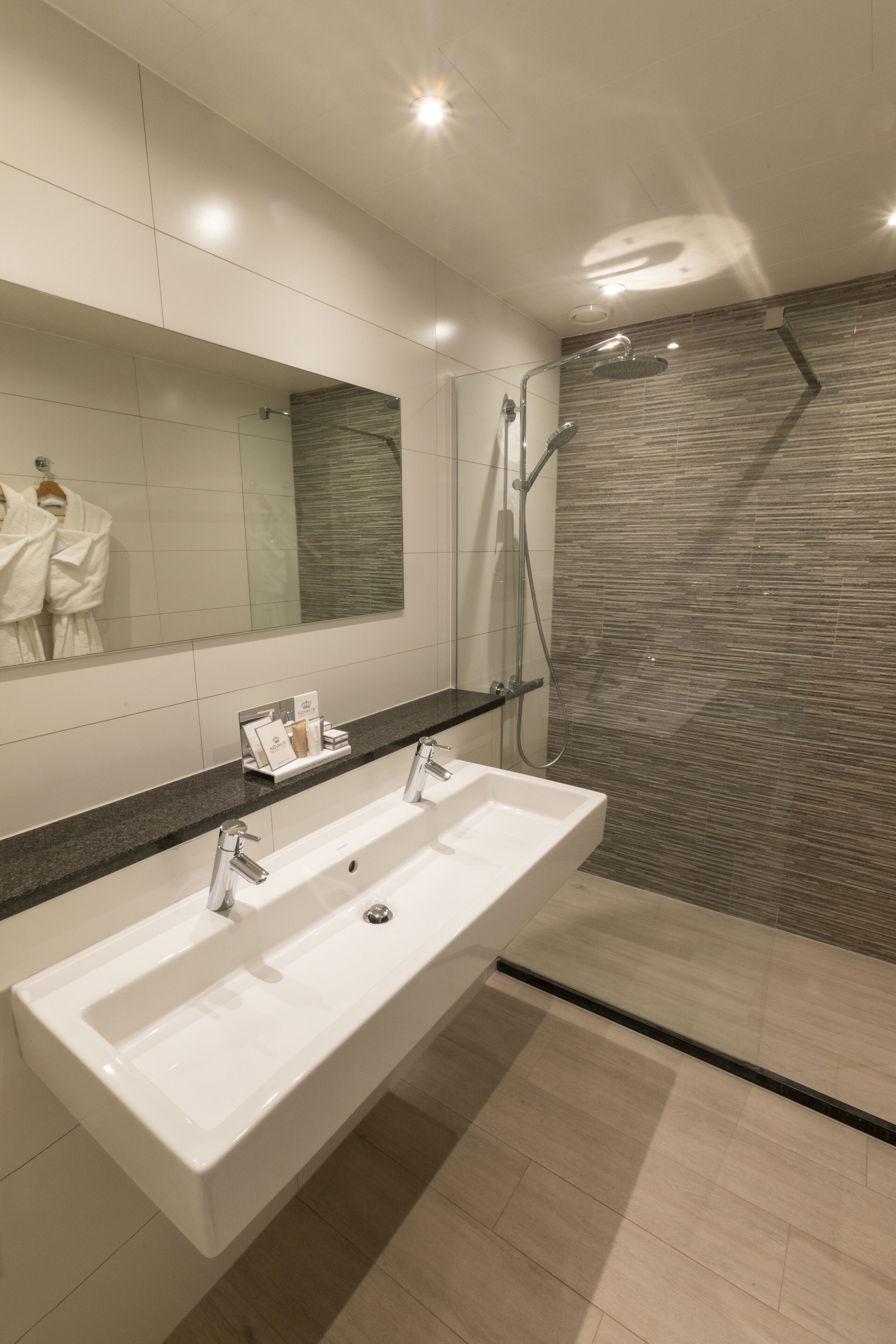 superior double room | bathroom | free toiletries, hair dryer, soap, shampoo