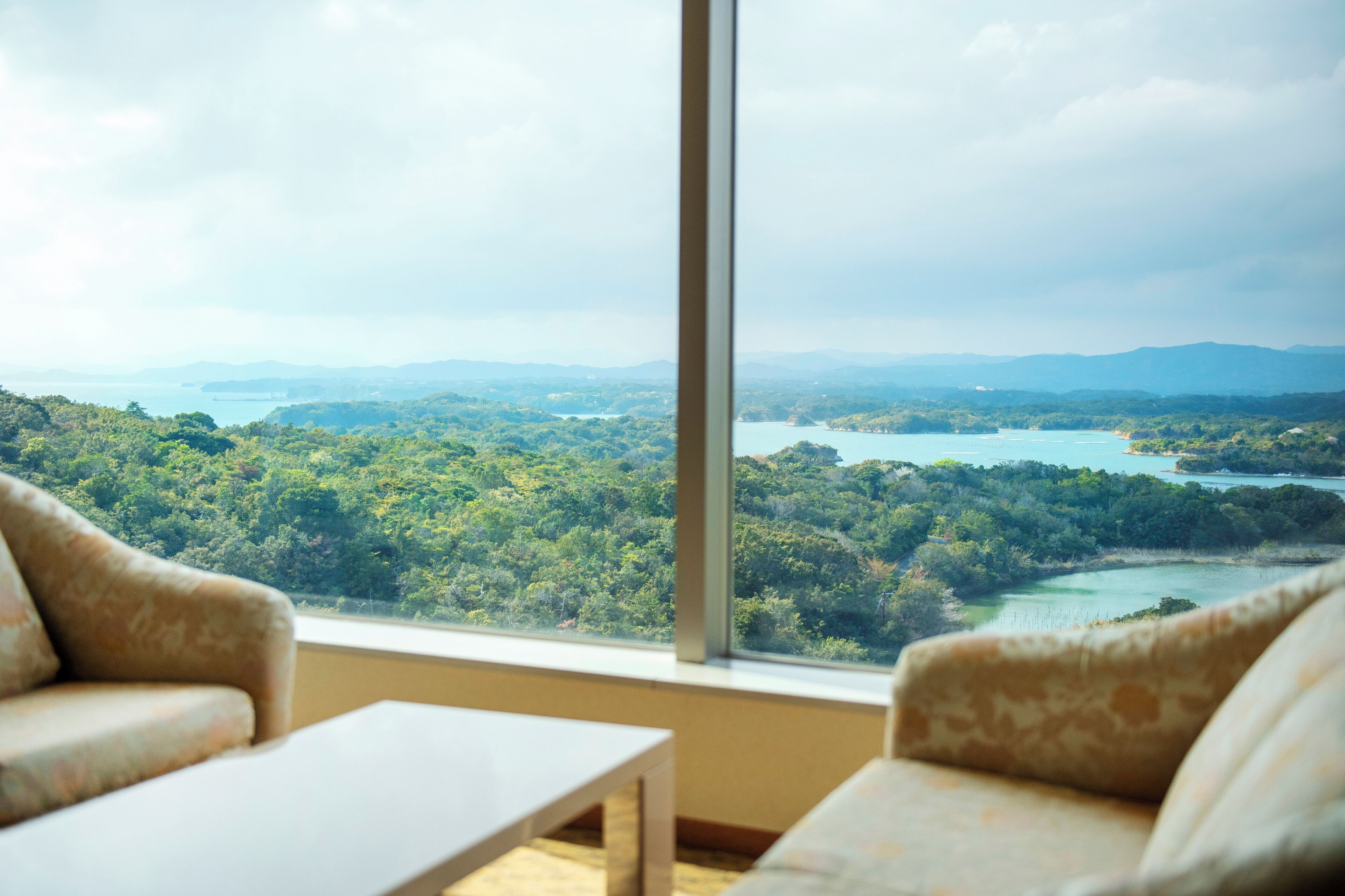 deluxe twin room | in-room safe, desk, laptop workspace, iron/ironing board