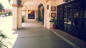 A building entrance with a sign reading "Bar" and a welcome poster. - Azul Sirena (Santa María Huatulco)