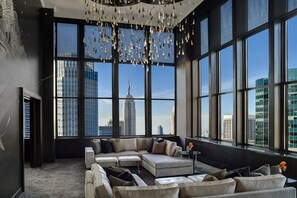 The Champagne Suite | Living area | 42-inch plasma TV with cable channels, TV, video-game console - The Towers at Lotte New York Palace (New York)
