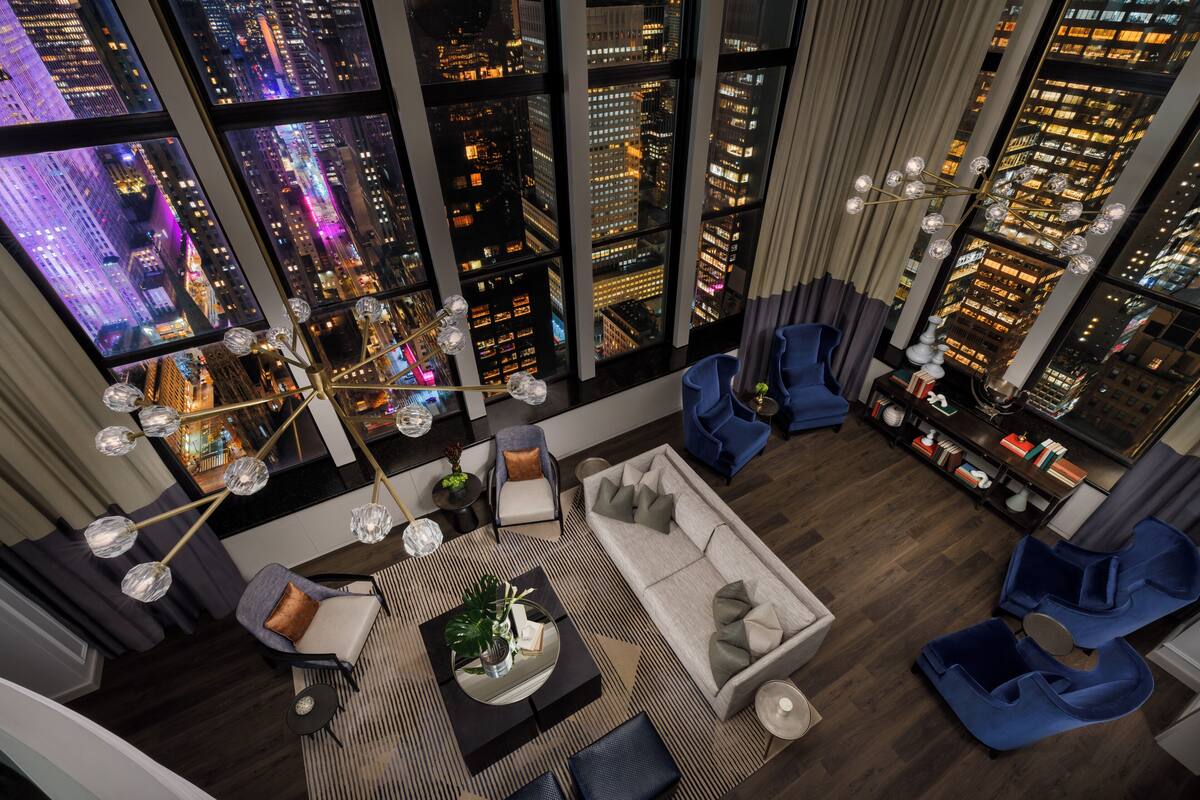 Penthouse (Towers, Suite) | Living area | 42-inch plasma TV with cable channels, TV, video game console