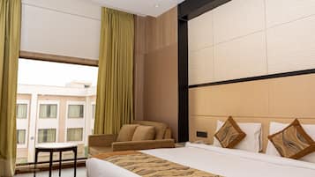 Deluxe Double Room, Non Smoking, Garden View | Minibar, in-room safe, desk, laptop workspace
