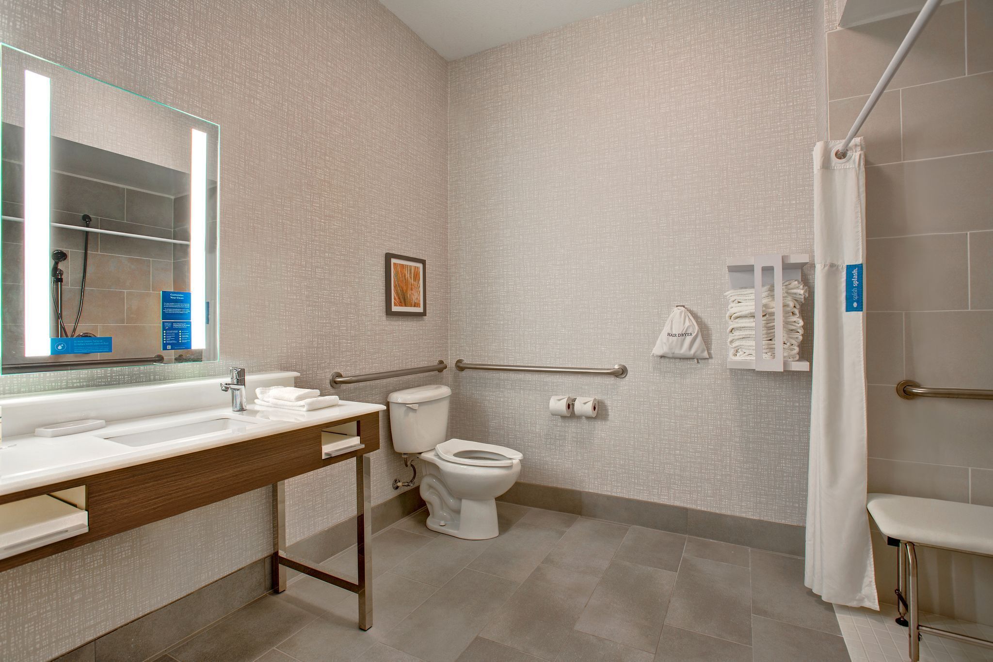 room, 1 king bed, accessible (roll-in shower, mobility & hearing) | bathroom | designer toiletries, hair dryer, towels, soap