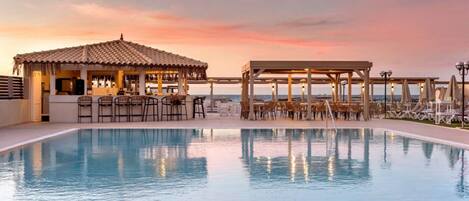 Outdoor pool, pool umbrellas, pool loungers