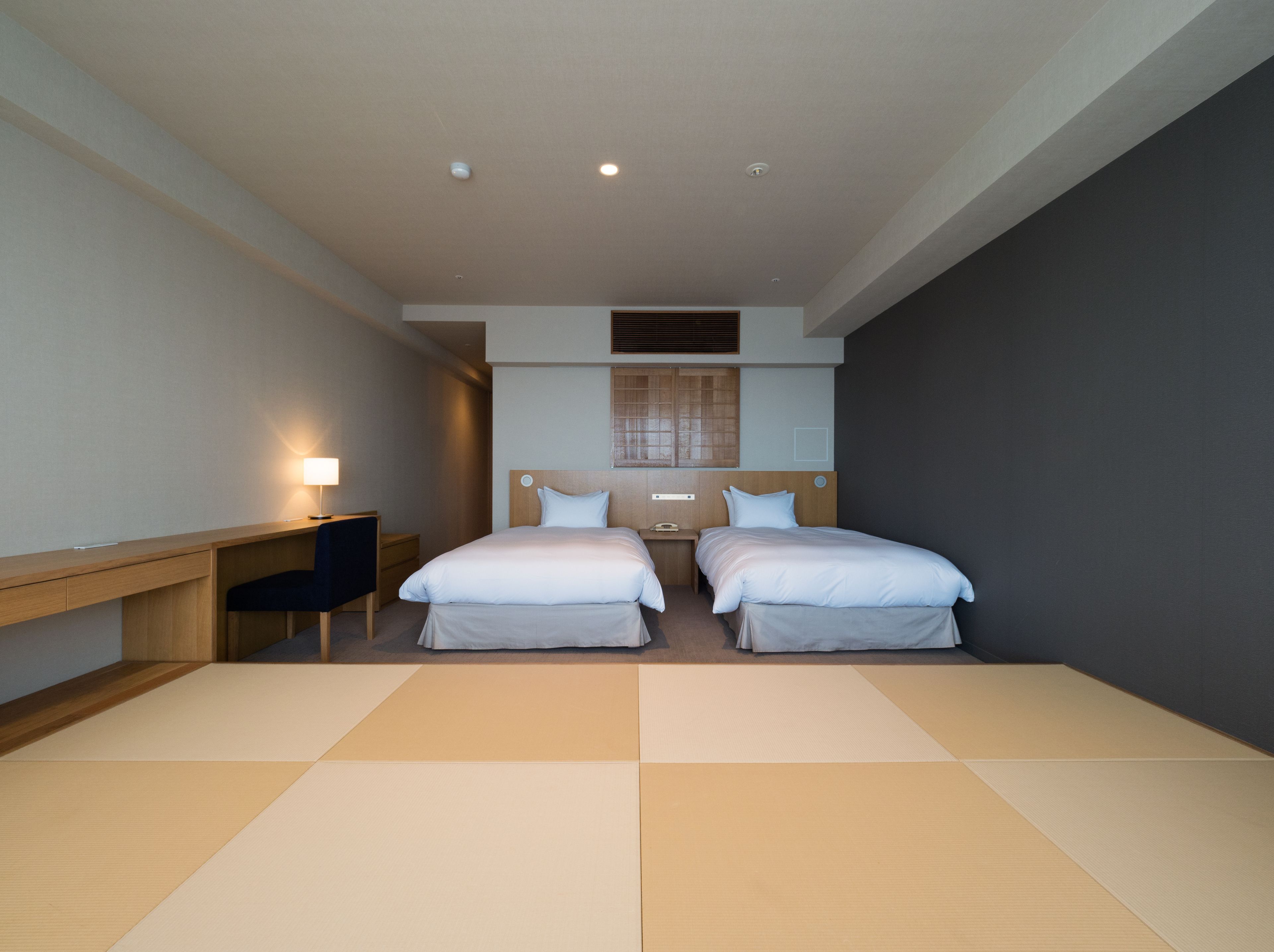 deluxe room, non smoking - 40sqm, up to 4 guests | down duvets, in-room safe, desk, free wifi