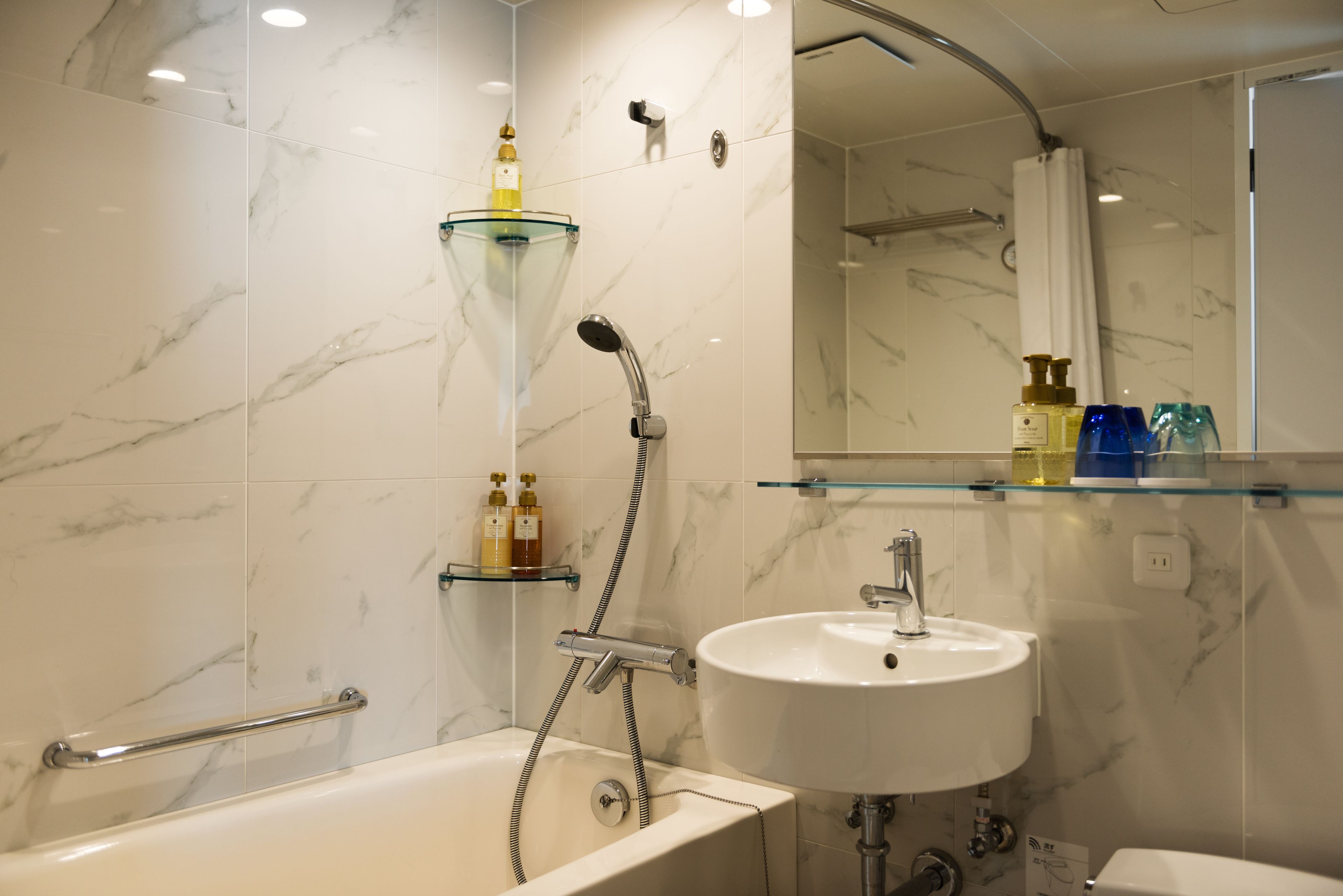 free toiletries, hair dryer, slippers, electronic bidet