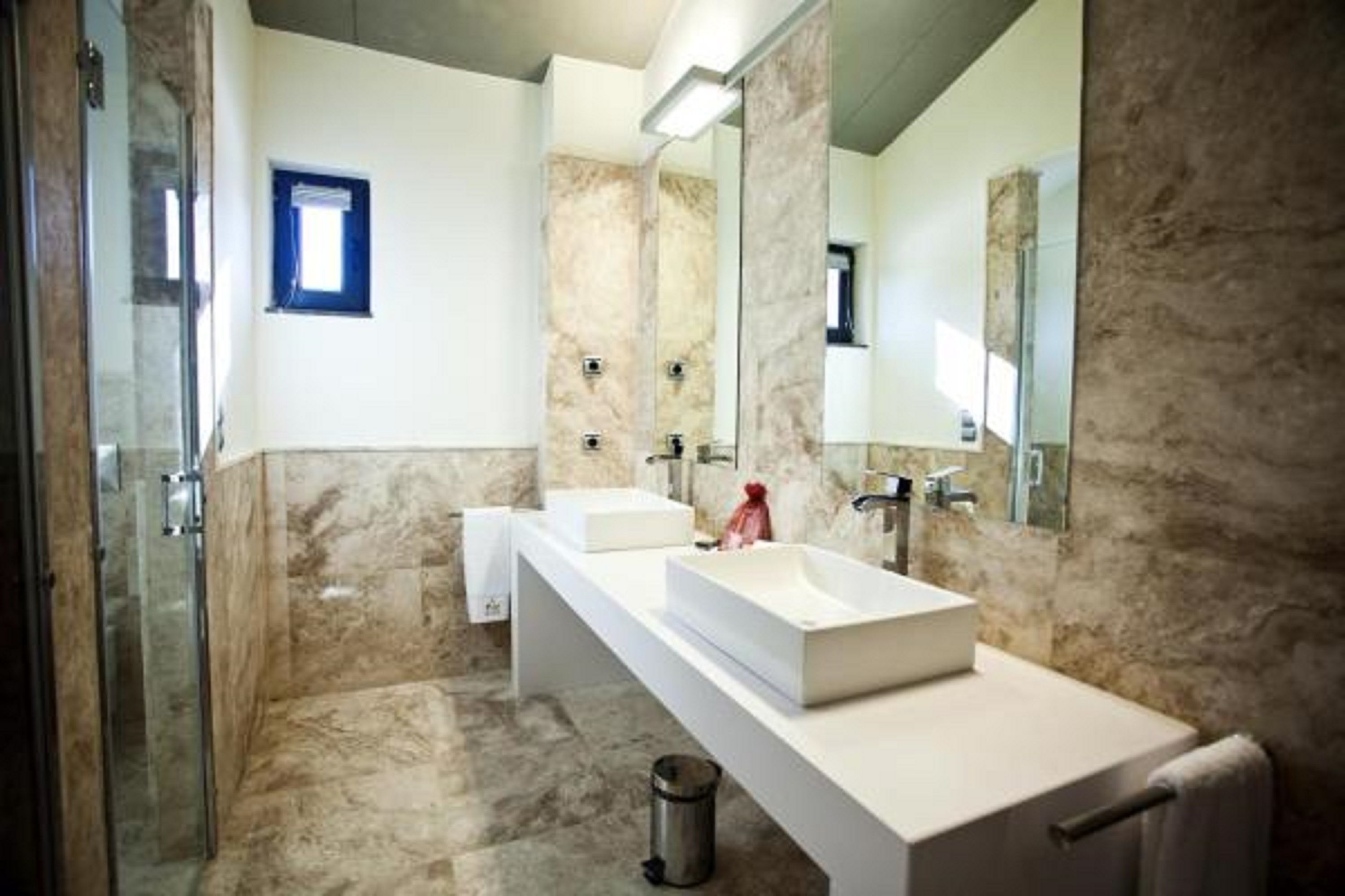 designer toiletries, hair dryer, bathrobes, bidet