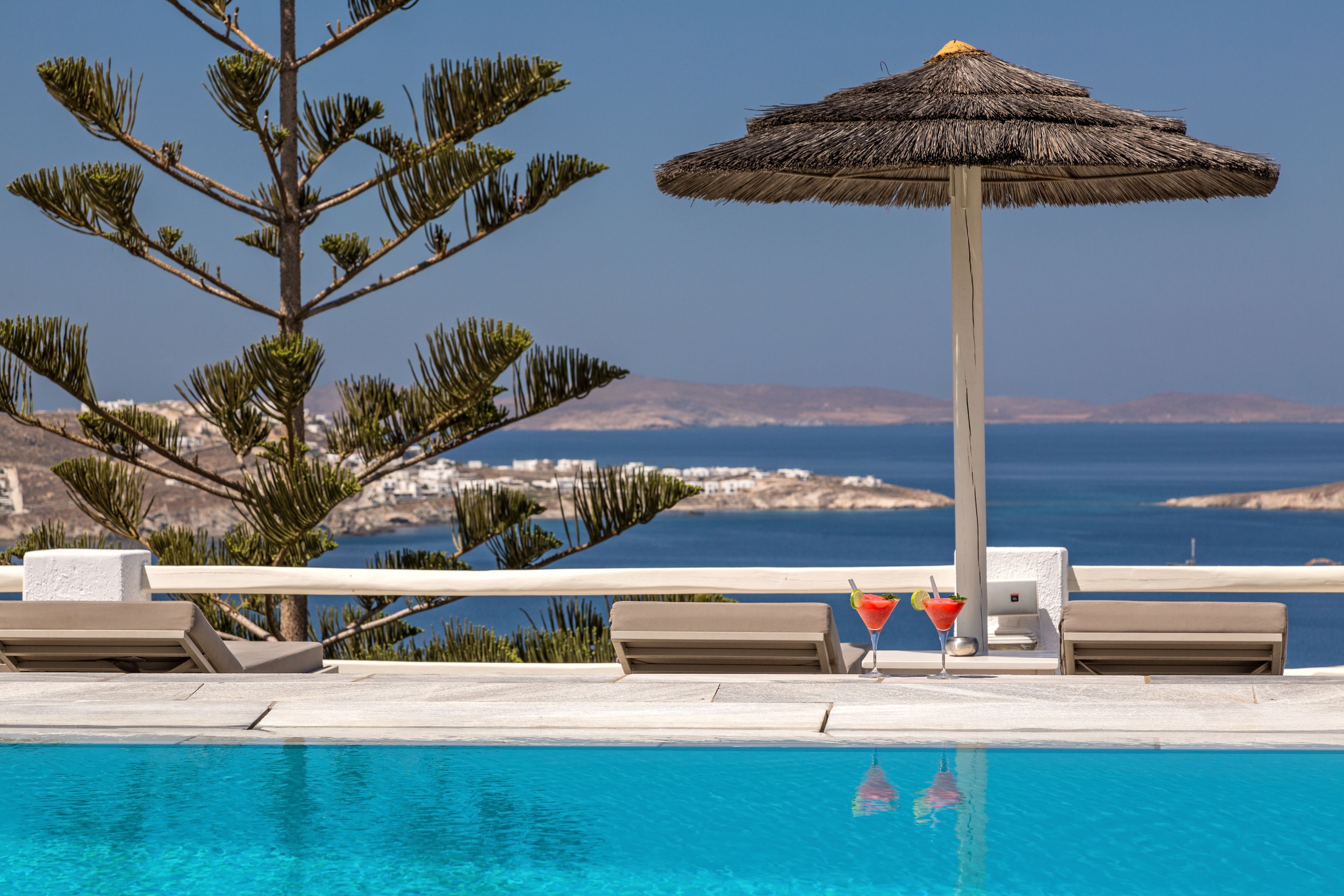 outdoor pool, pool umbrellas, pool loungers