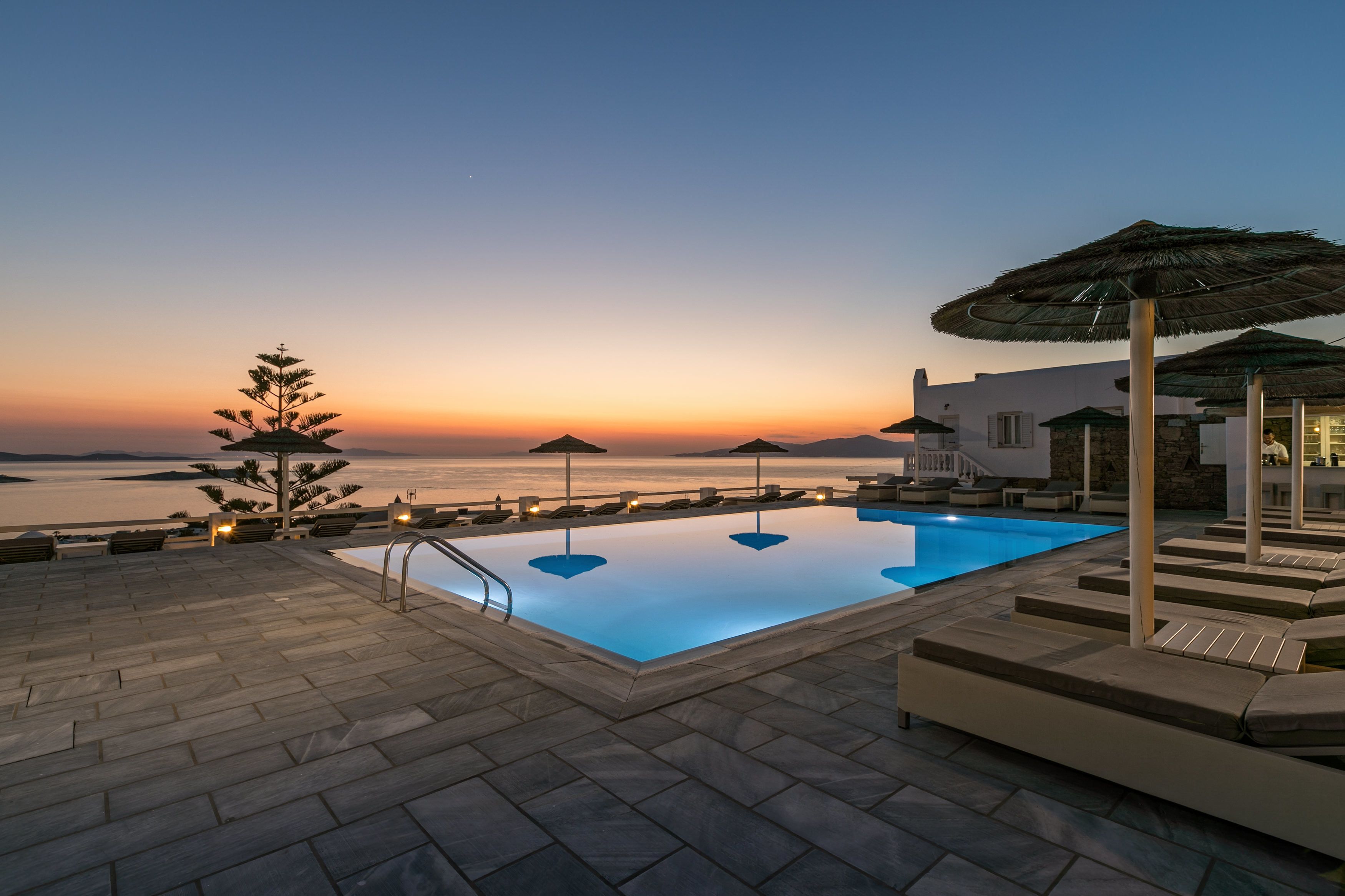 outdoor pool, pool umbrellas, pool loungers