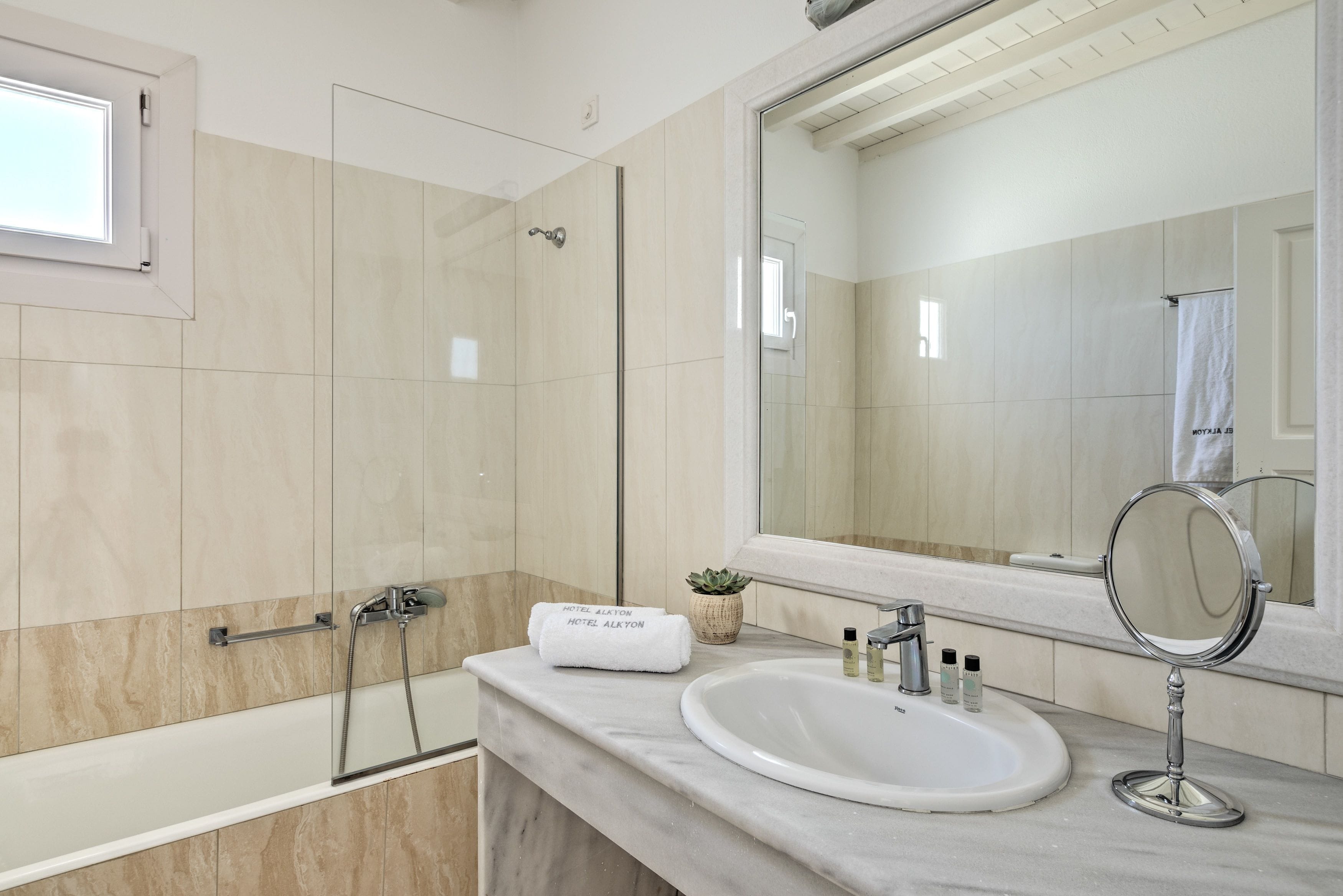 combined shower/bathtub, free toiletries, hair dryer, slippers