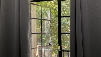 Junior Suite, Balcony | 1 bedroom, in-room safe, free WiFi, bed sheets