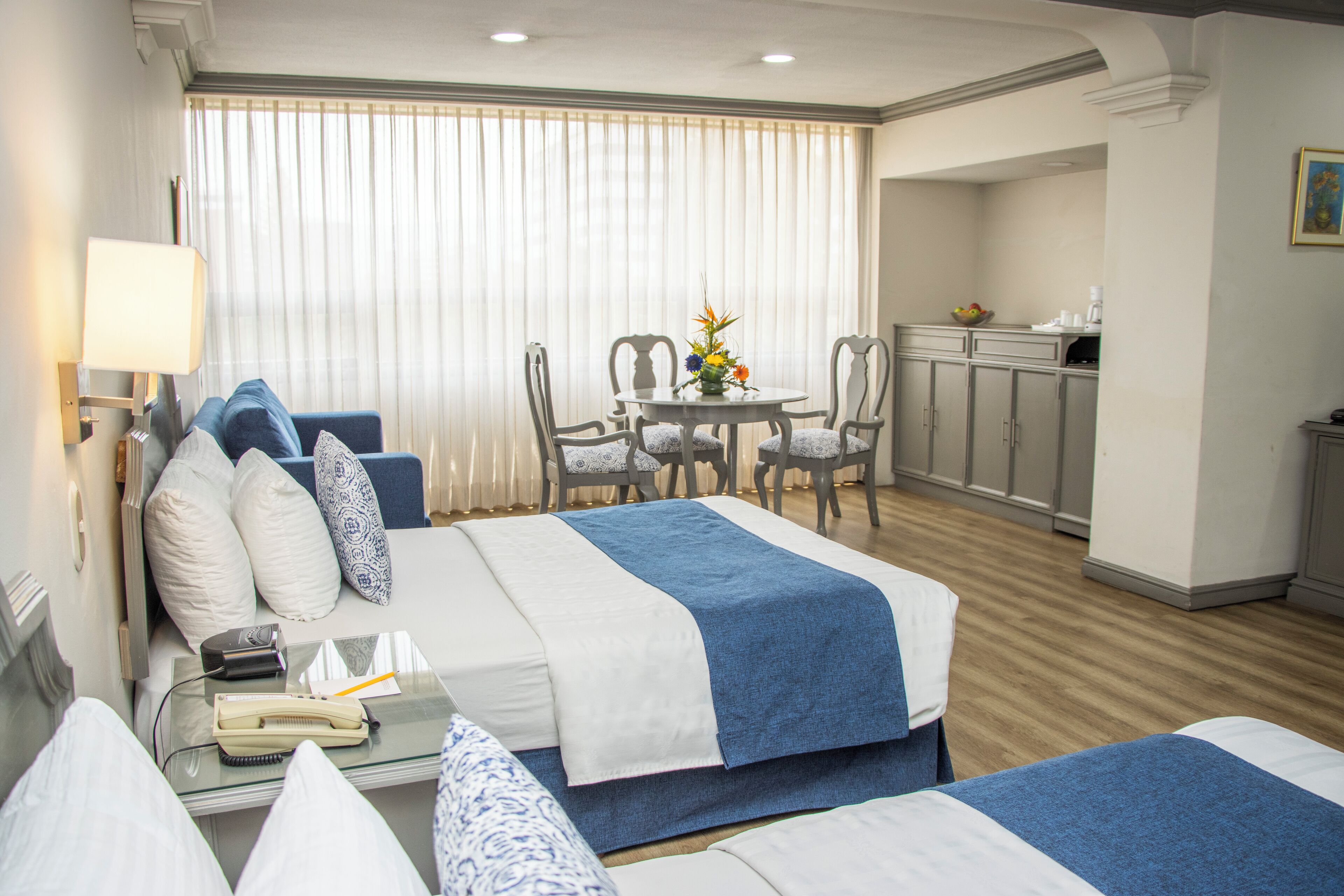 junior suite, 2 double beds, kitchenette | in-room safe, free wifi, bed sheets