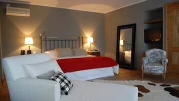 Habitación Deluxe | Ropa de cama hipoalergénica y minibar