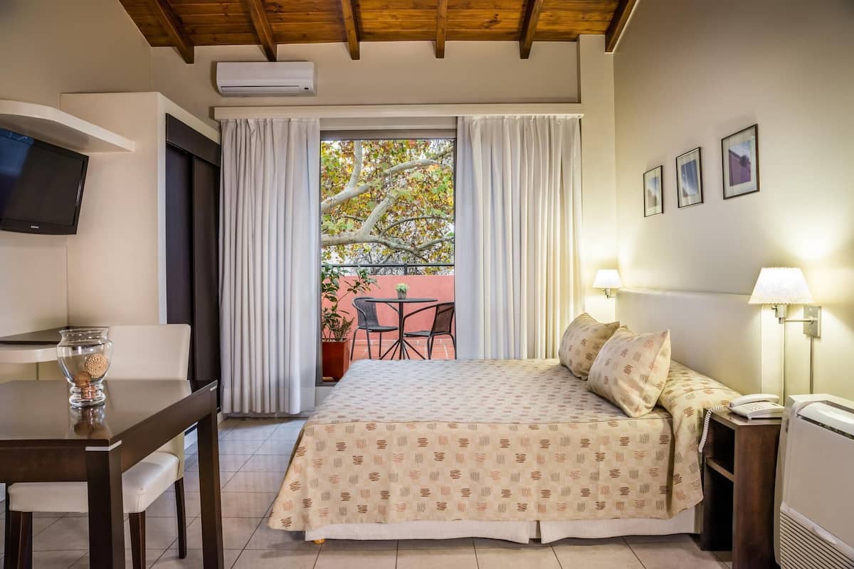 Premium bedding, down comforters, pillowtop beds, minibar