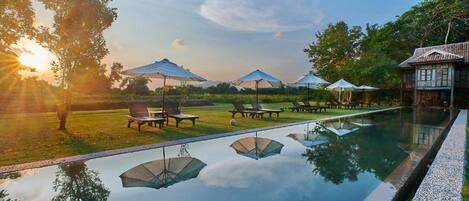 2 outdoor pools, pool umbrellas, sun loungers