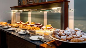 A buffet with various desserts and pastries. - Maritalia Hotel Club Village - All Inclusive (Peschici)