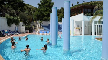 2 outdoor pools, a lap pool, open 10 AM to 7:30 PM, pool loungers