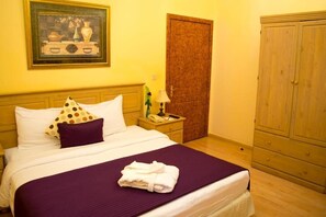 Premium bedding, down duvets, Select Comfort beds, minibar