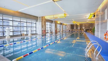 Indoor pool, open 6:00 AM to 10:00 PM, pool loungers