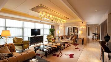 Presidential Suite | Living area | 42-inch LCD TV with satellite channels, TV, iPod dock