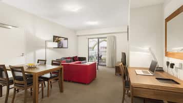 In-room safe, blackout curtains, iron/ironing board, cots/infant beds
