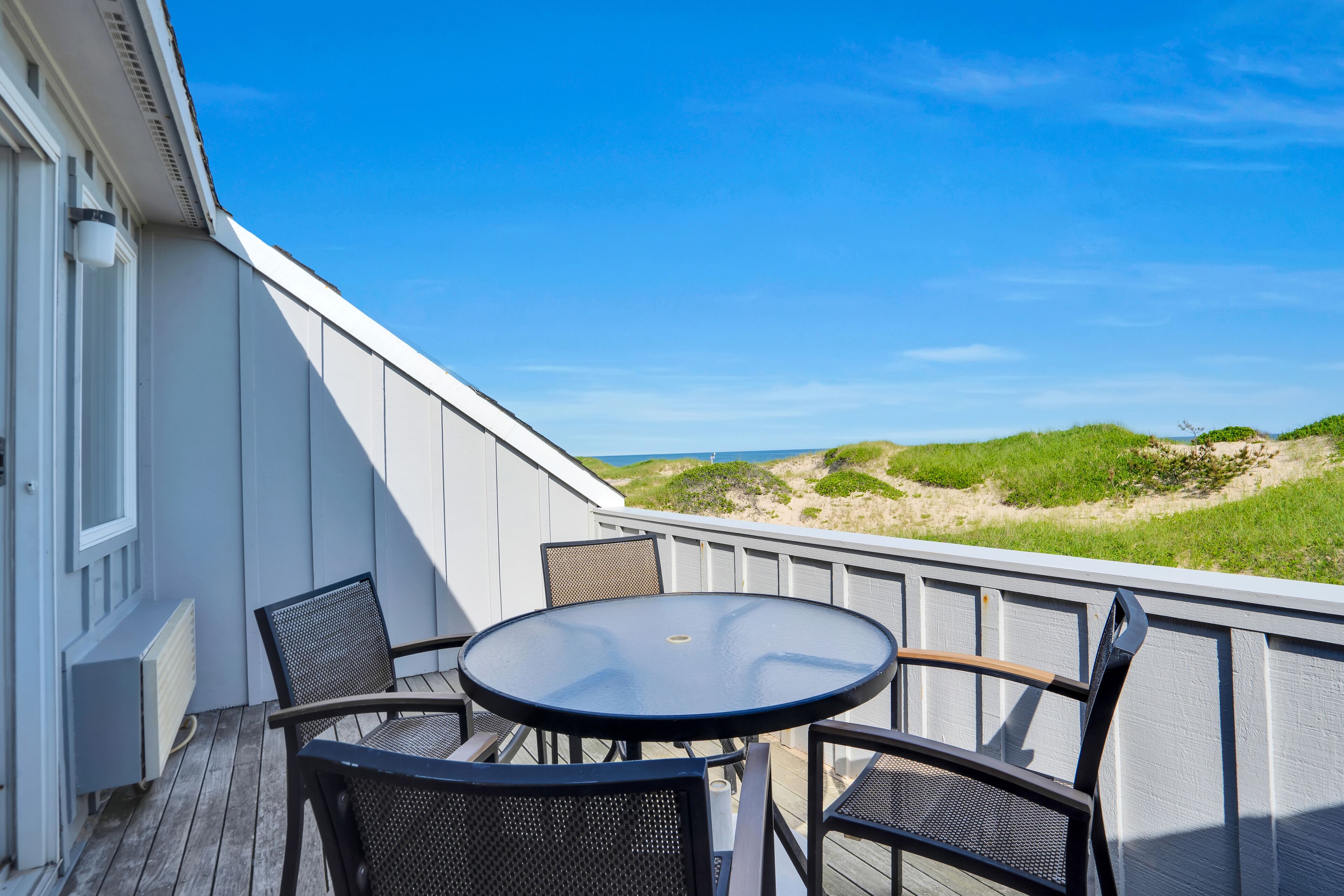 Partial Ocean View 2BD Corner Queen and 2 Twins | Terrace/patio