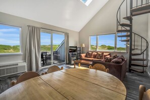 Partial Ocean View 2BD Corner Queen and 2 Twins | Living area | TV - Windward Shores Ocean Resort (Amagansett)
