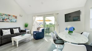 West 2BD Corner Queen and 2 Twins | Living area | TV - Windward Shores Ocean Resort (Amagansett)