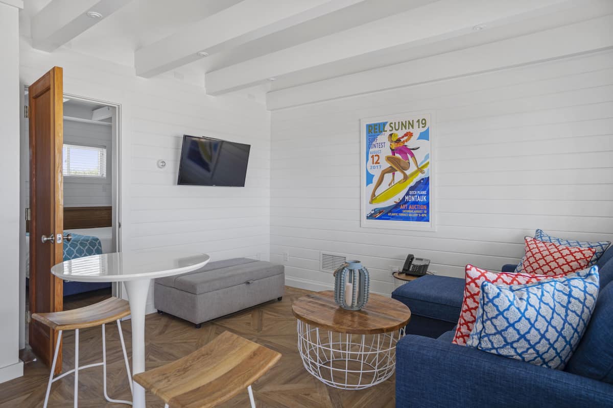 Apartment, 1 Bedroom | Living area | Flat-screen TV