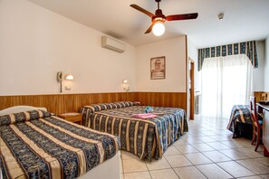 Basic Quadruple Room | Minibar, in-room safe, desk, free WiFi - Hotel Genzianella (Cervia)