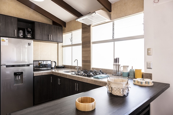 Comfort Apartment | Private kitchen | Dining tables