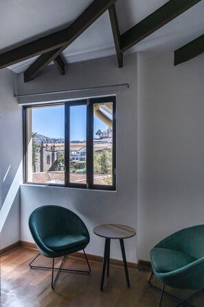 Comfort Apartment | Down comforters, in-room safe, individually decorated - Hostal El Triunfo (Cusco)