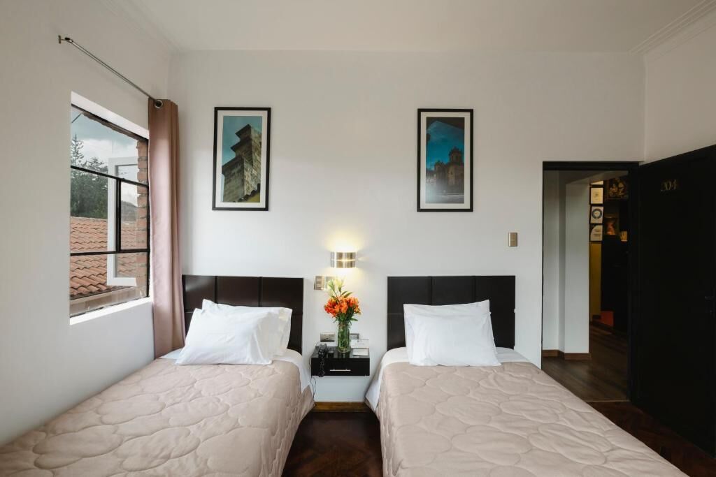Standard Room, 2 Twin Beds | Down comforters, in-room safe, individually decorated