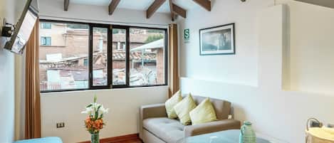 City Apartment, 1 King Bed | Down comforters, in-room safe, individually decorated