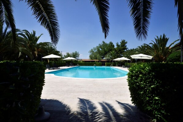 Outdoor pool, pool umbrellas, pool loungers