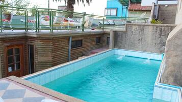 Outdoor pool, sun loungers