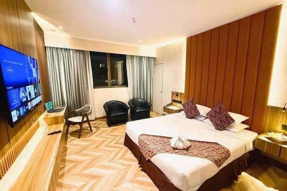 Minibar, bureau, chambres insonorisées, fer et planche à repasser