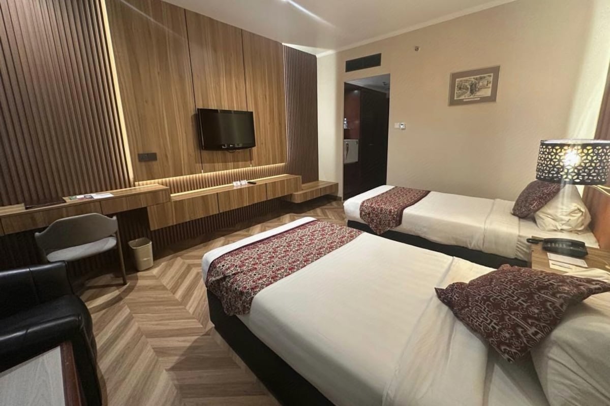 Minibar, bureau, chambres insonorisées, fer et planche à repasser