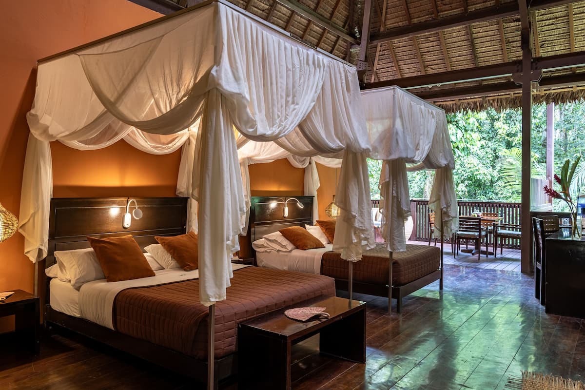 Deluxe Suite, 2 Queen Beds, Terrace, Garden View | In-room safe, desk, bed sheets