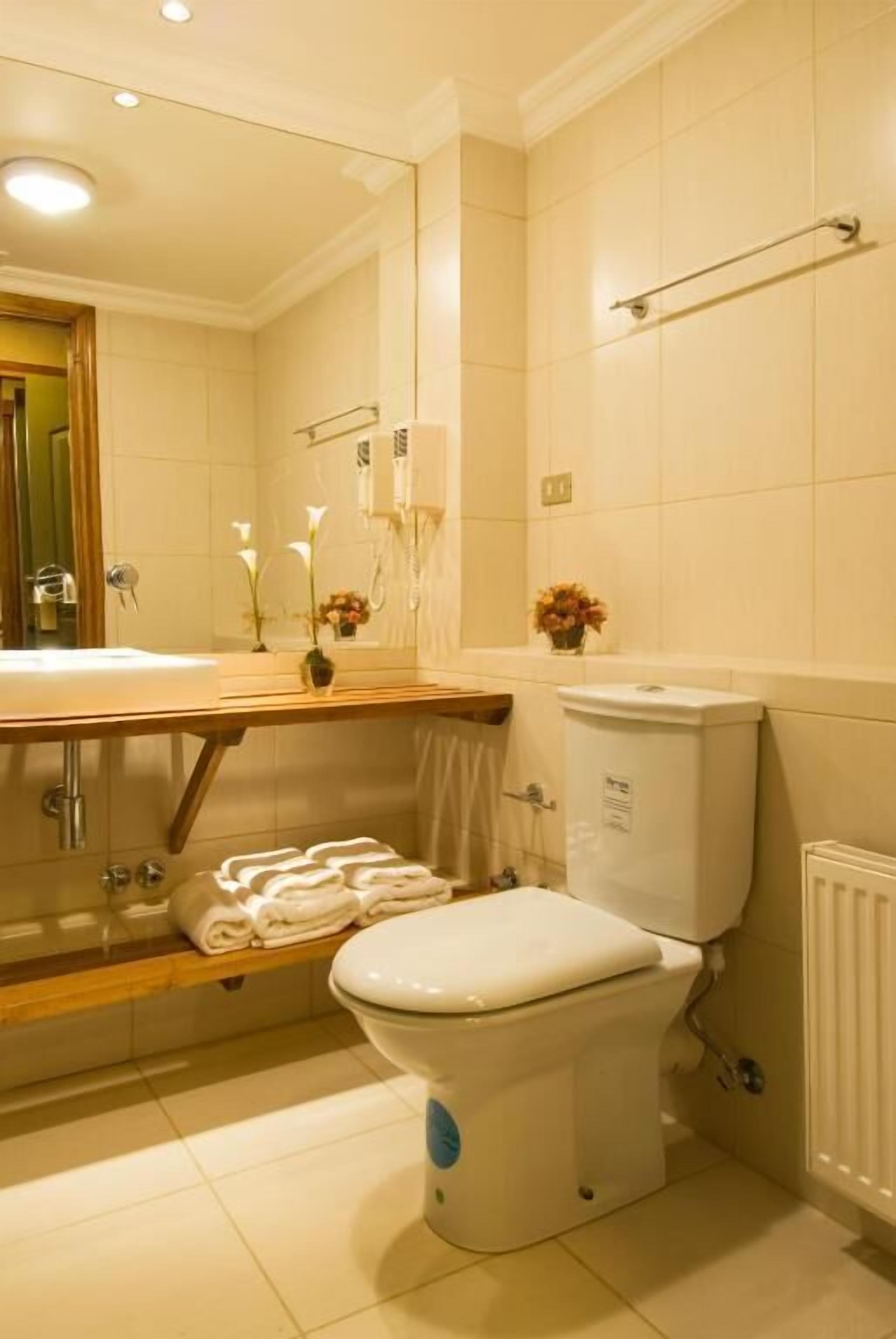 superior room | bathroom | deep-soaking bathtub, rainfall showerhead, eco-friendly toiletries