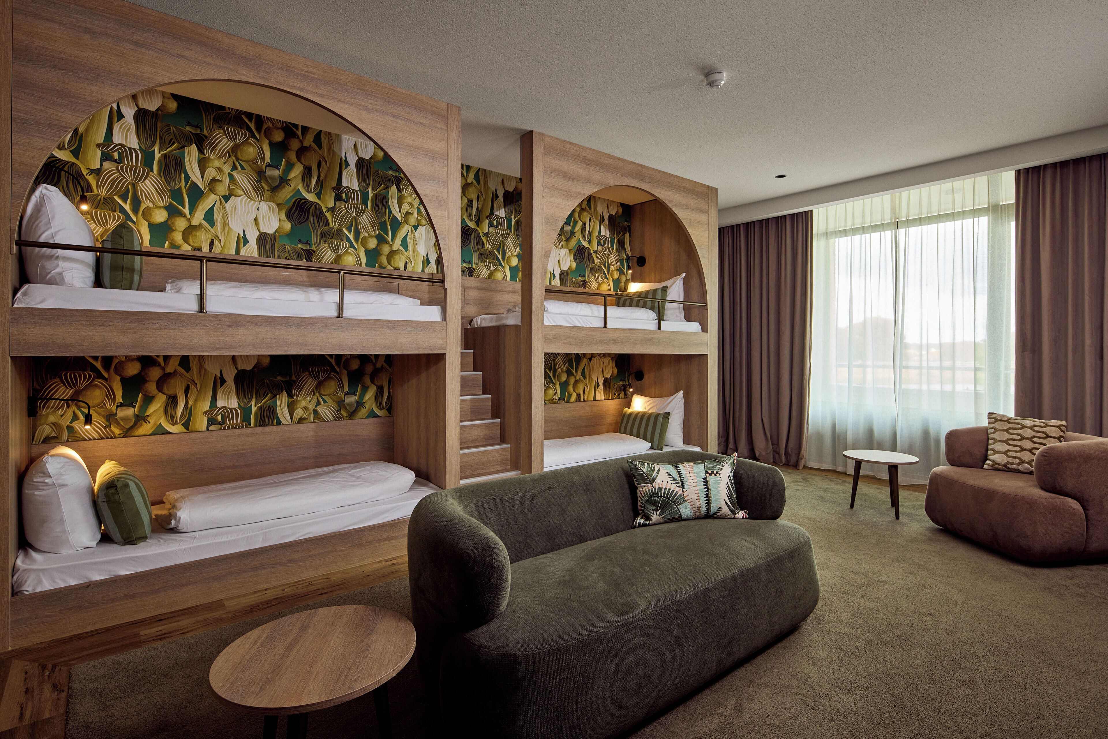 deluxe room, multiple beds, jetted tub, canal view | minibar, in-room safe, individually furnished, desk