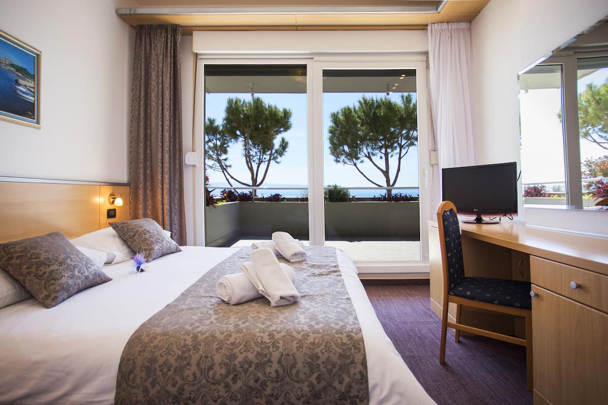 Family Suite, Terrace | Minibar, in-room safe, desk, laptop workspace