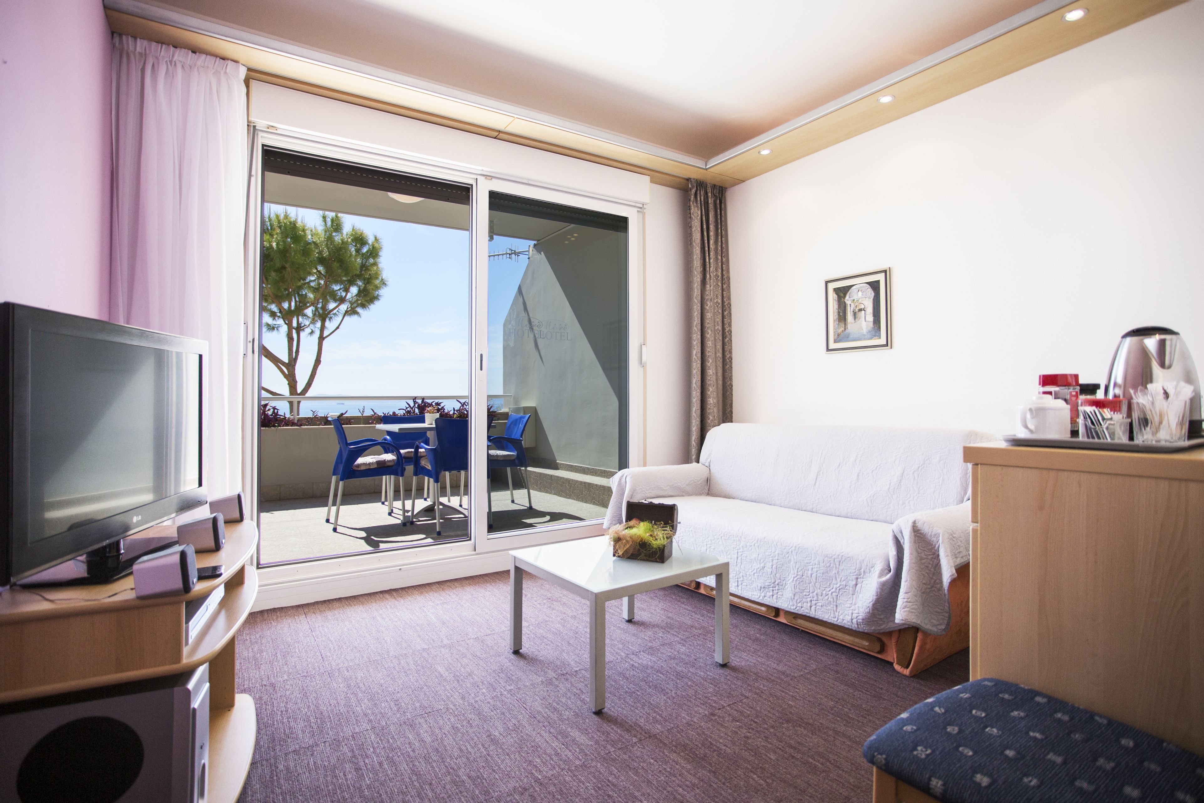 family suite, terrace | living area | flat-screen tv, dvd player